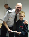 Richard's son Nathan receiving YFA certificate