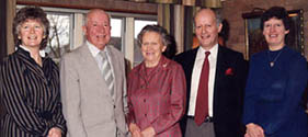 Sara with her mother and father